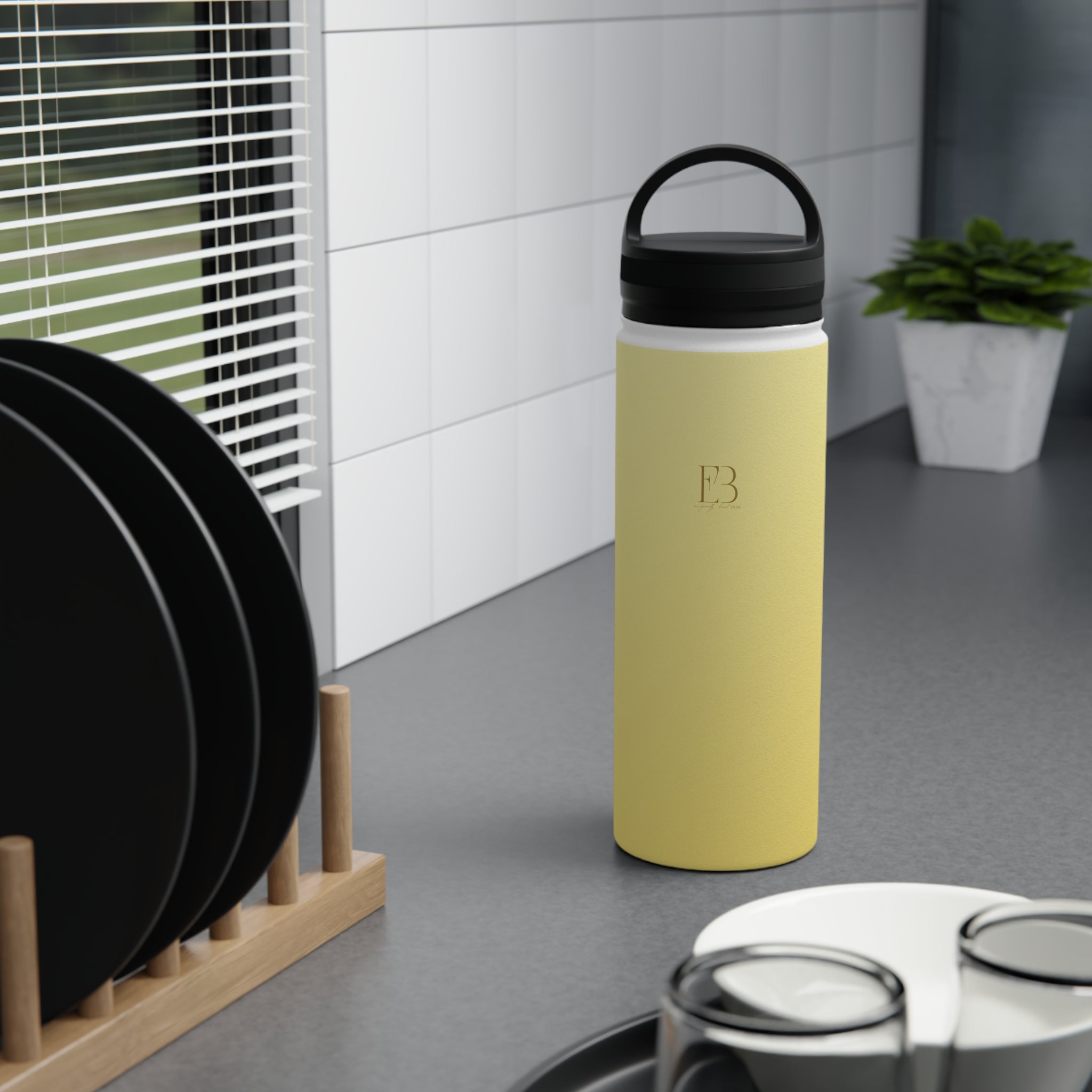 Lemon yellow insulated water bottle with black flip-top lid.