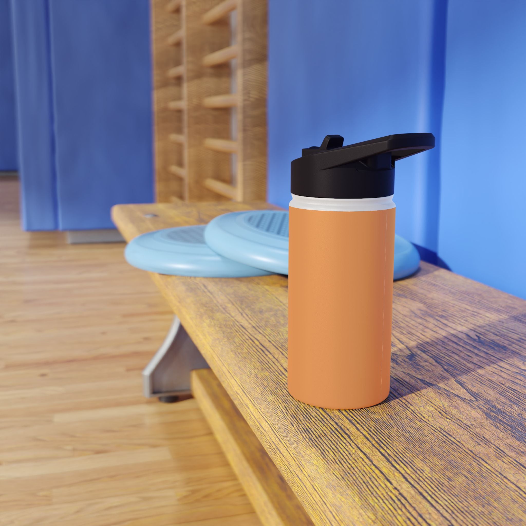 Matte gold insulated water bottle with black sports lid, side view