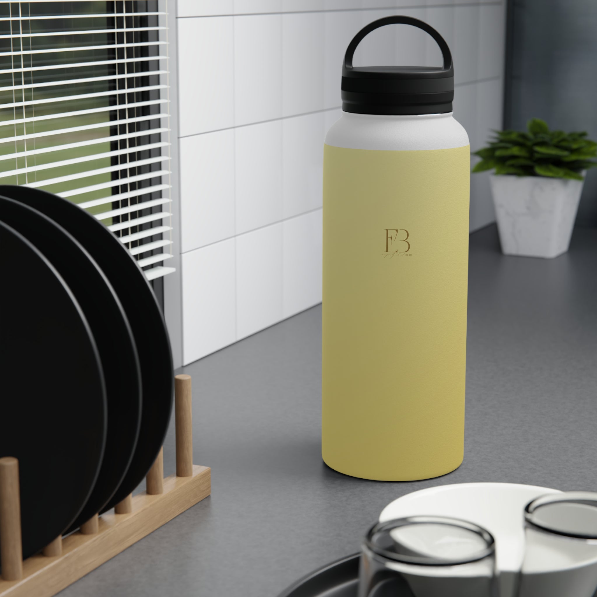 Insulated stainless steel water bottle with black handle lid, lemon-yellow finish
