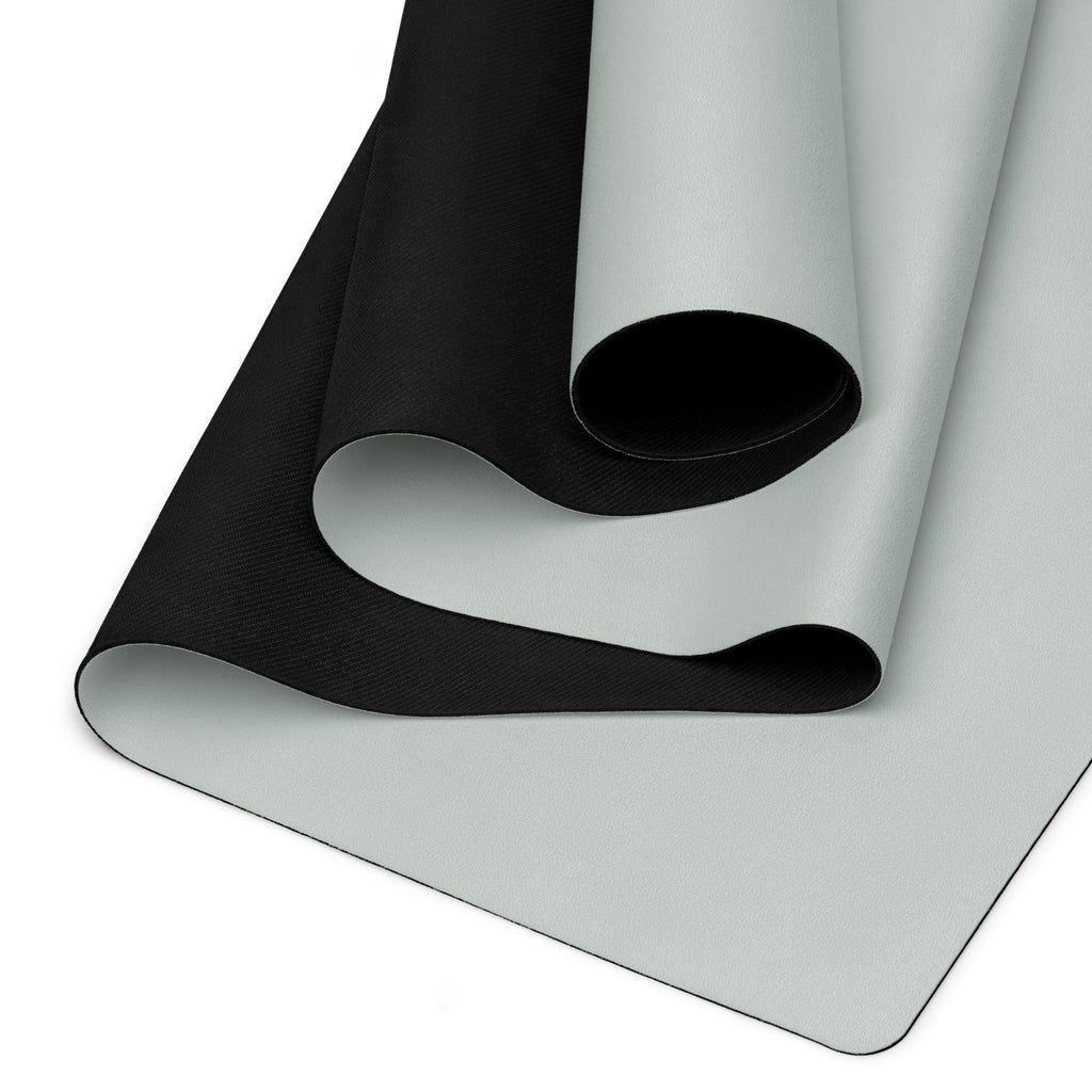 Sage yoga mat with black textured grip underside