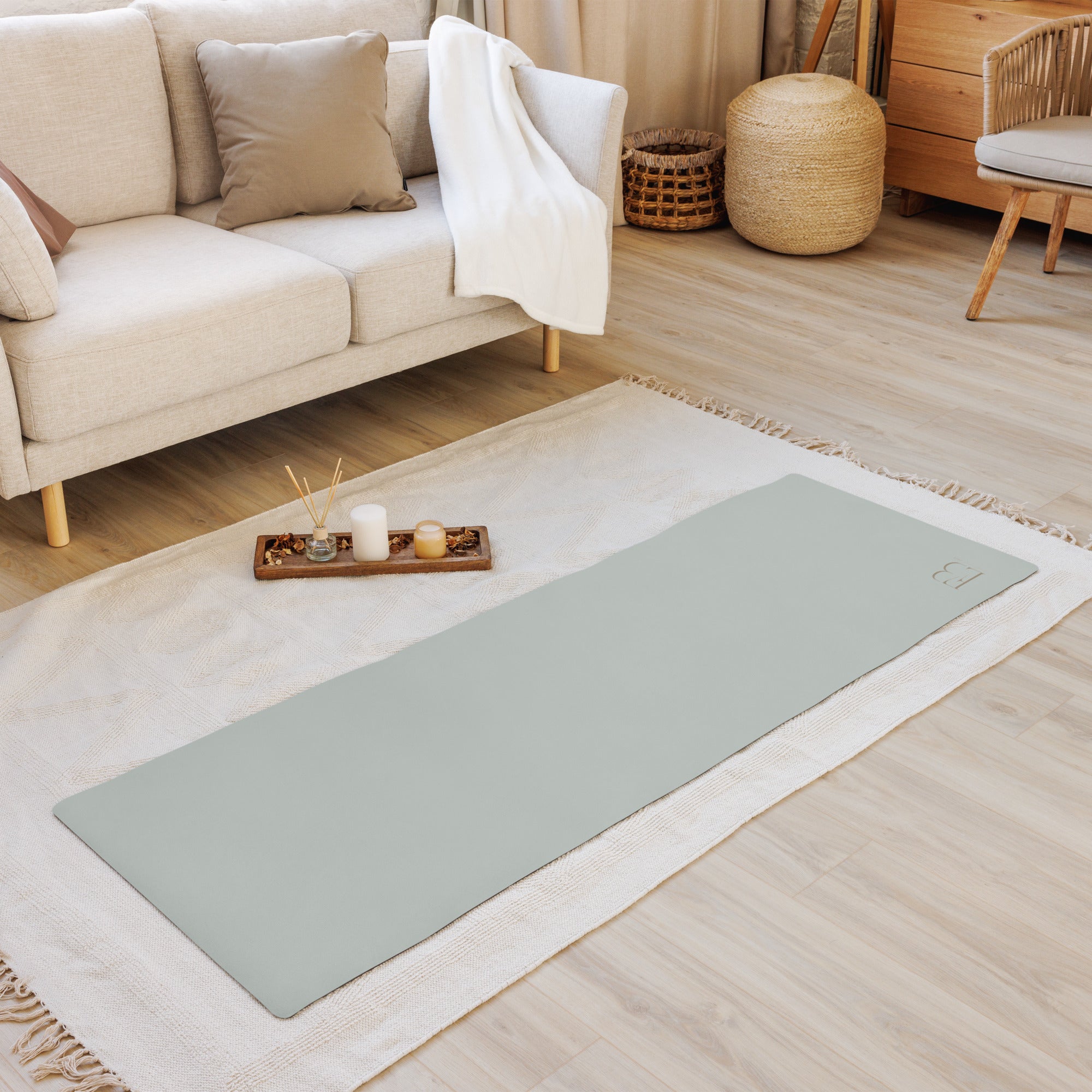 Eco Black Misty Sage natural rubber yoga mat in soft green tone
