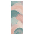 Natural rubber yoga mat with pastel teal and pink swirl design