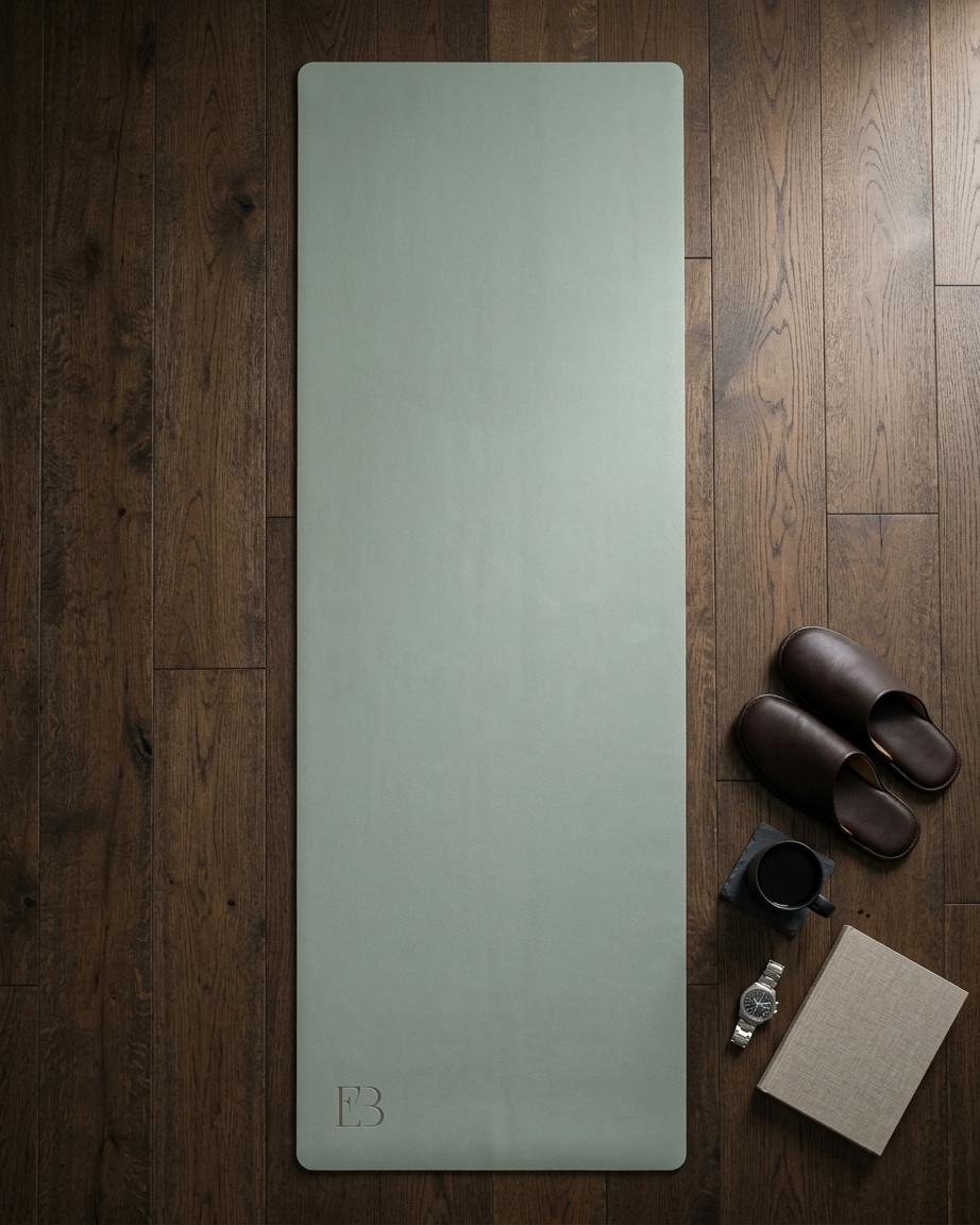 Sage green yoga mat with subtle E3 logo