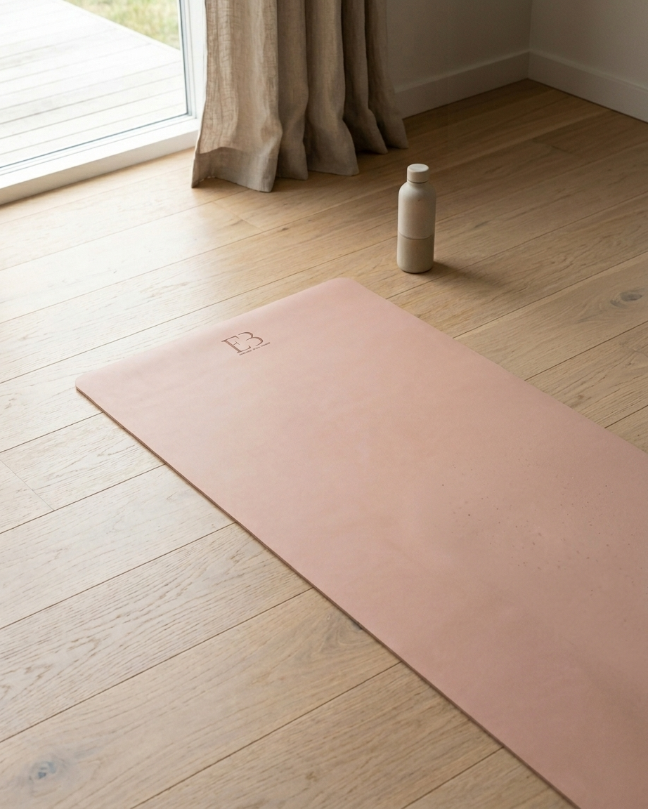 Pink yoga mat on a wooden floor with a bottle nearby Blushing Petal Natural Rubber Yoga Mat | Non-Toxic & Eco-Friendly | Eco Black