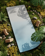 Light blue yoga mat lying flat with natural cork blocks nearby