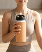 Insulated stainless steel water bottle, amber body with black flip-top lid