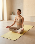 Lemon yellow natural rubber yoga mat for seated yoga pose
