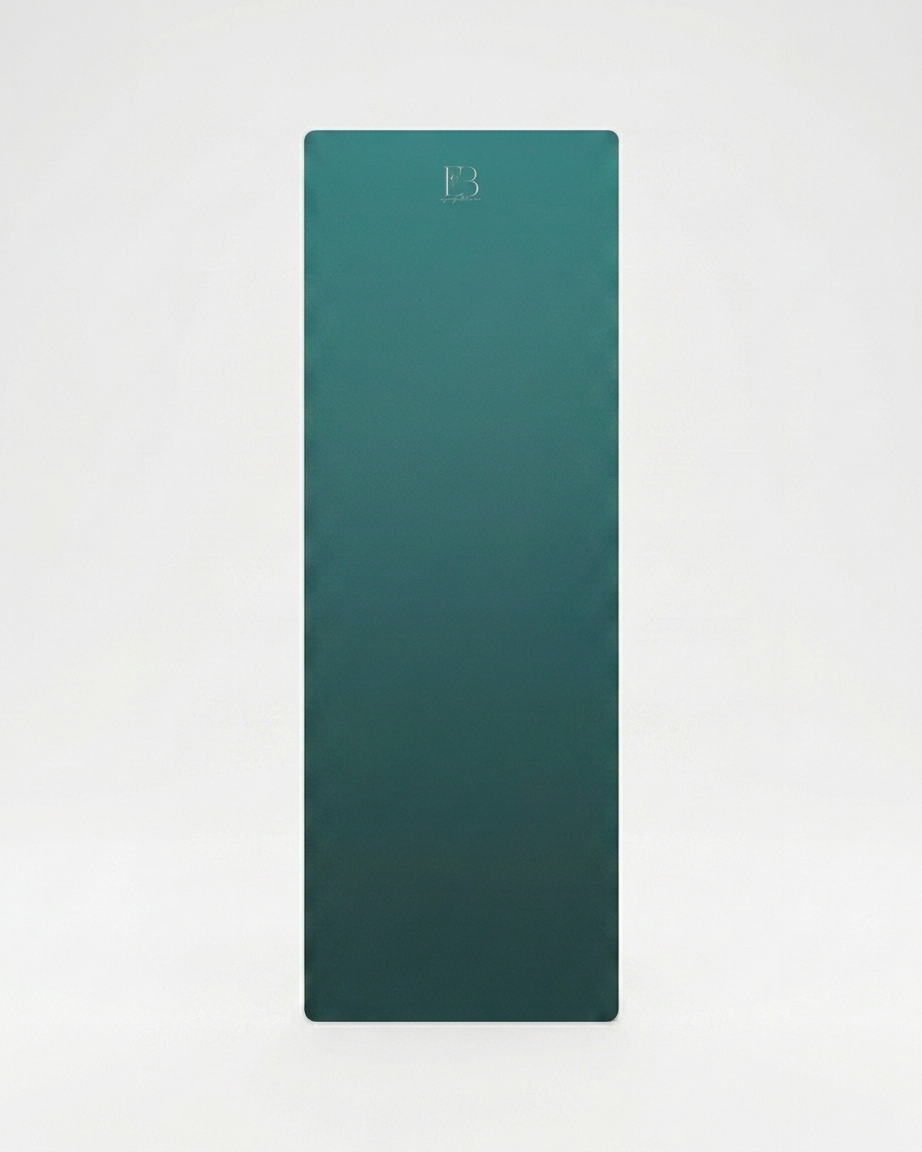 Deep teal yoga mat with small B3 logo, flat rectangular design