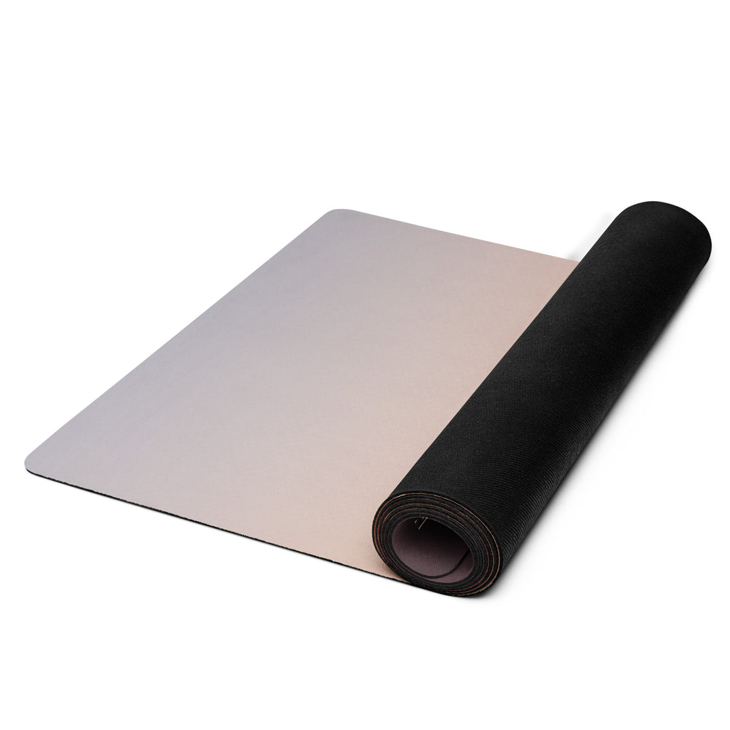 Rolled yoga mat with mauve surface and black rolled outer edge