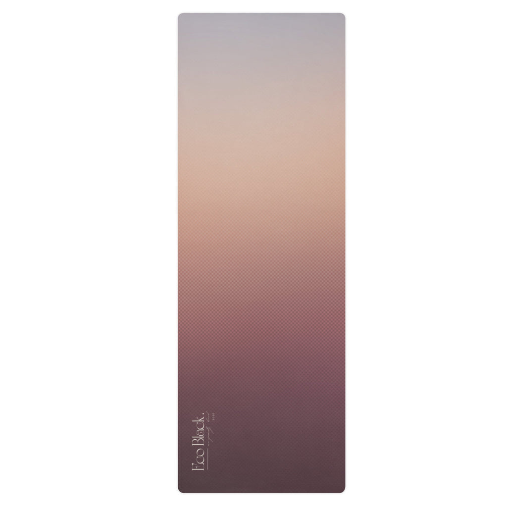 Yoga mat upright with mauve textured surface and small brand lettering