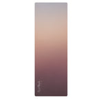 Yoga mat upright with mauve textured surface and small brand lettering
