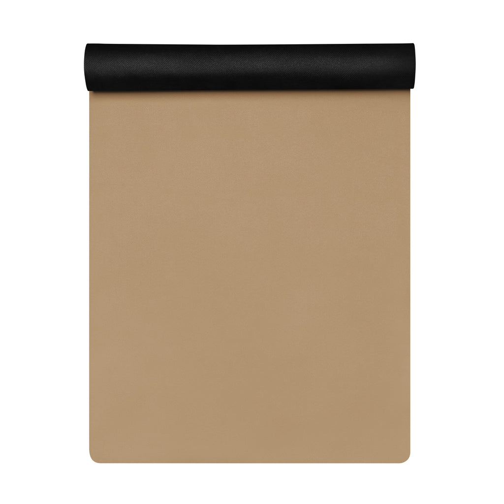 Folded tan natural rubber yoga mat with black top roll visible.