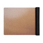 Brown yoga mat with black rolled edge