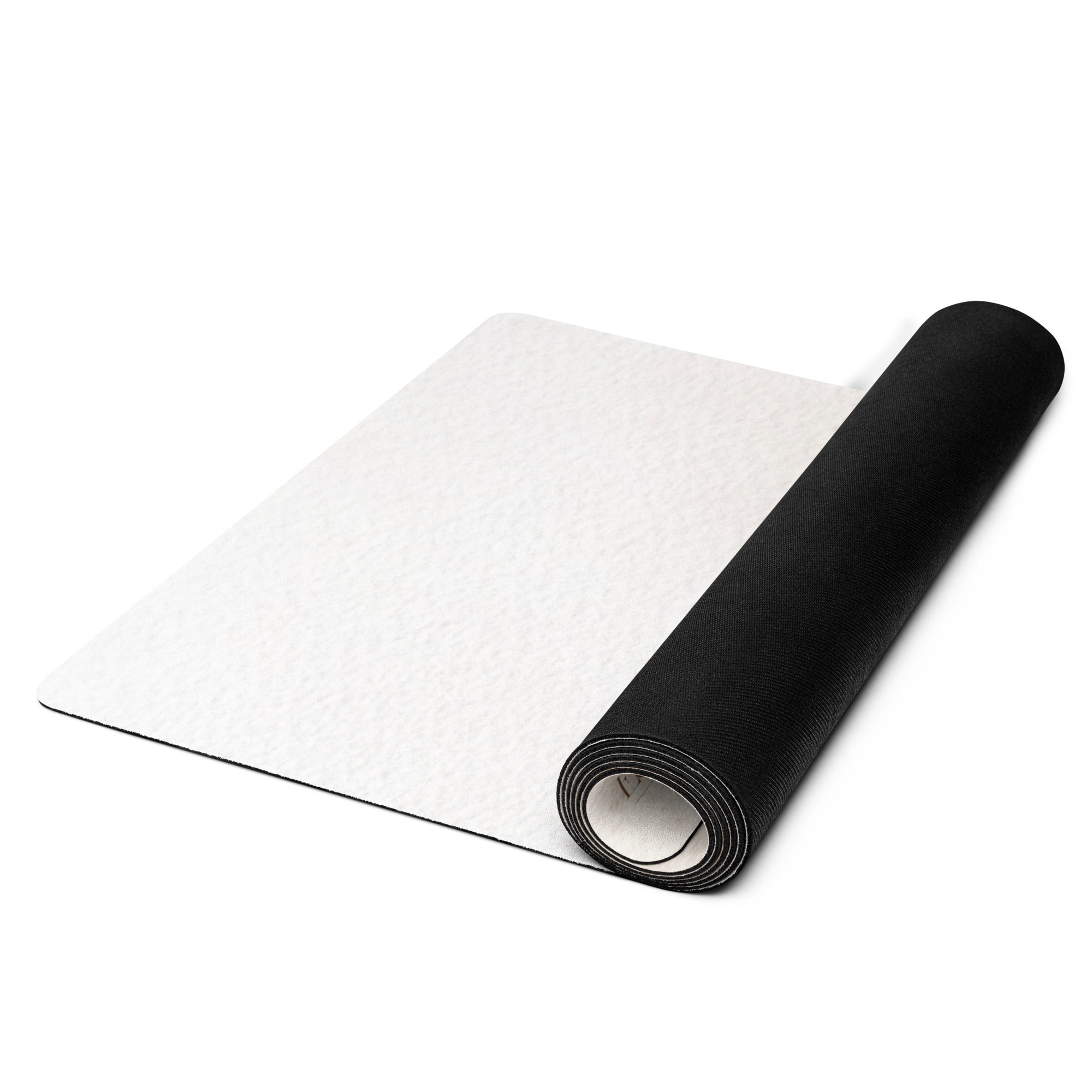 Rolled yoga mat: light beige top with black underside, side view