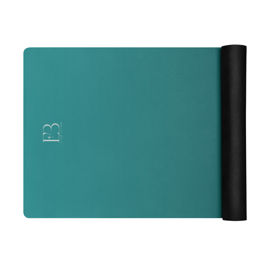 Deep teal yoga mat with B3 logo and black rolled accessory sleeve