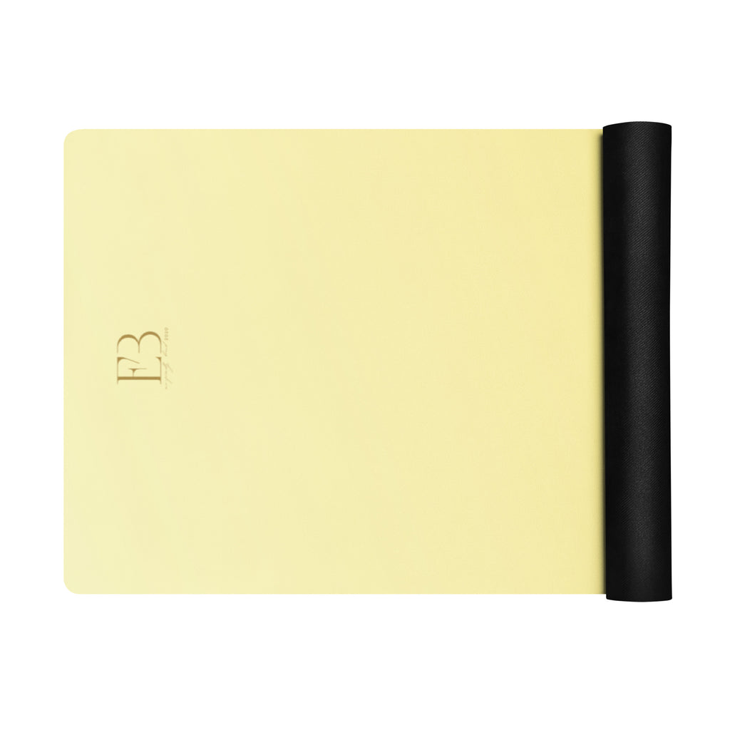 Natural rubber yoga mat with lemon-yellow surface and black rolled side