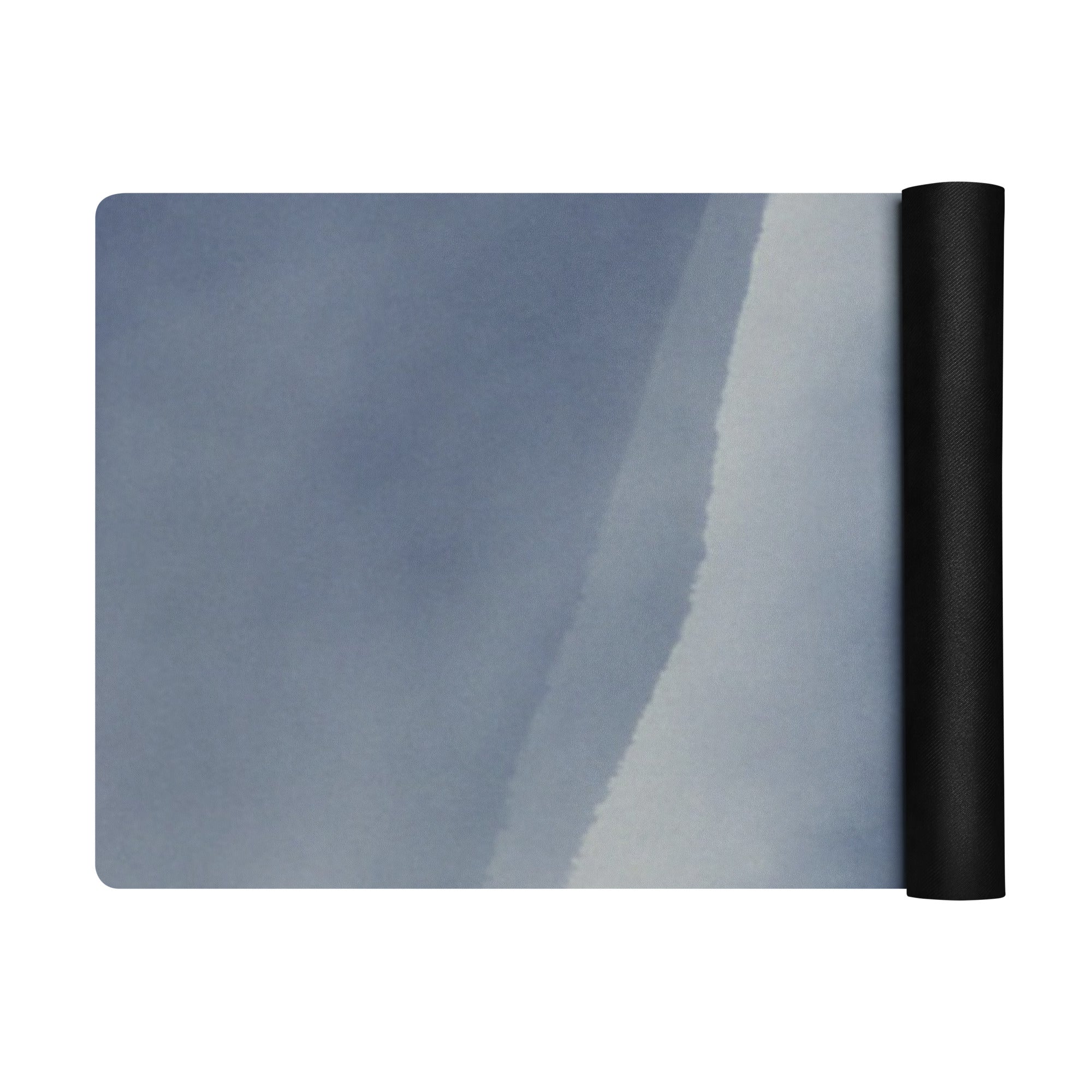 Yoga mat rolled up, blue-gray surface with black rolled edge