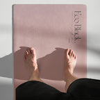 Natural rubber yoga mat in violet-pink with horizon graphic and textured finish
