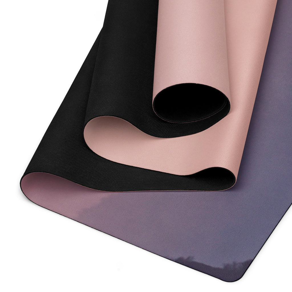 Natural rubber yoga mat showing non-slip texture and curved edge