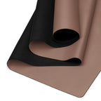 Chocolate yoga mat showing black textured grip underside