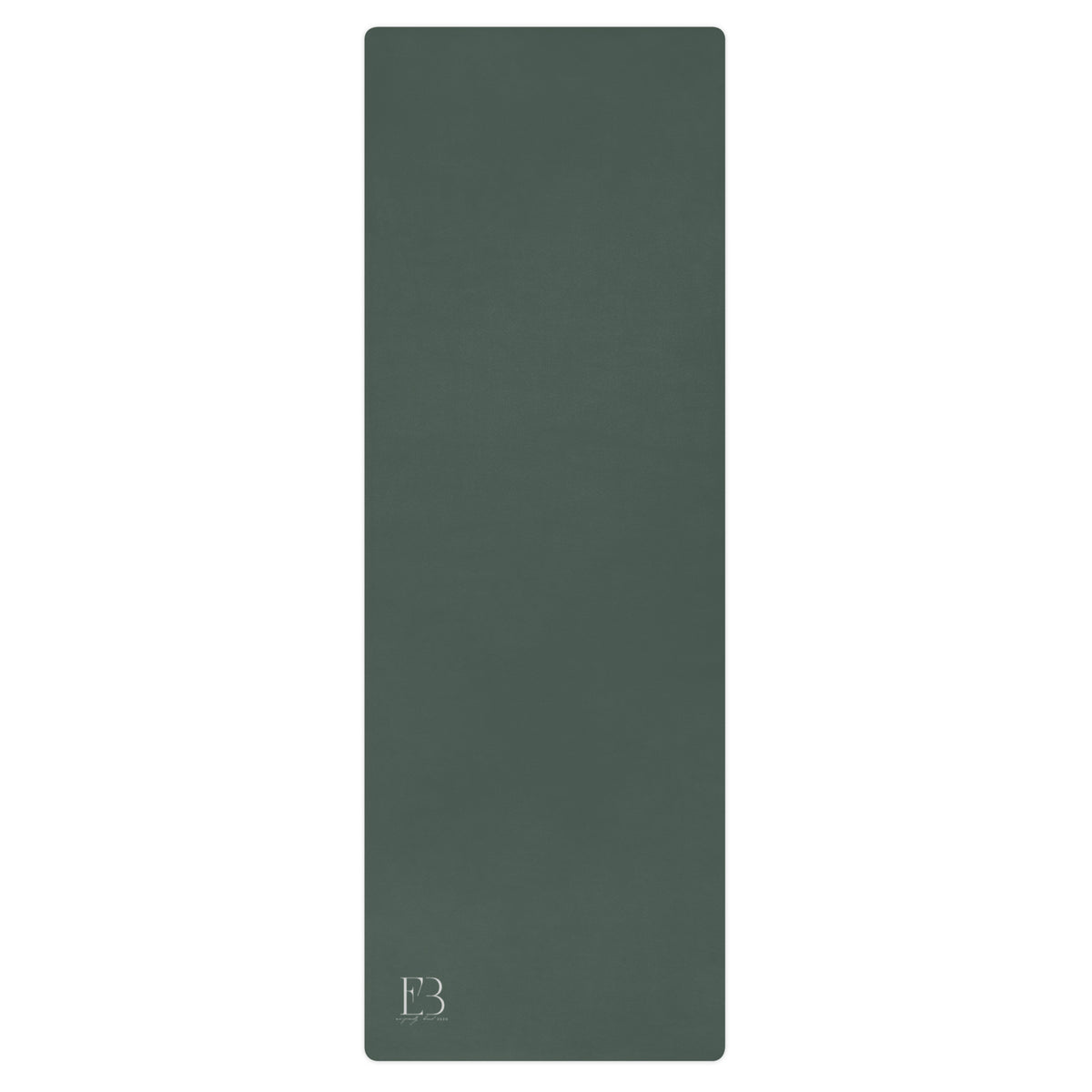 Solid natural rubber yoga mat in dark green with smooth surface and small logo
