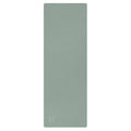 Natural rubber yoga mat in muted sage green