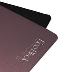 Close-up of mauve yoga mat surface with black textured border