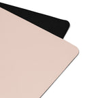 Blush pink natural rubber yoga mat with black border edge