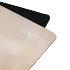 Beige natural rubber yoga mat with black non-slip edge and rounded corners
