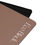 Chocolate yoga mat corner close-up with white "Lopaldia" logo